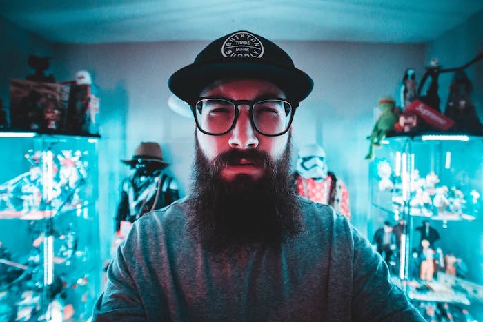 Bearded man in glasses and hat