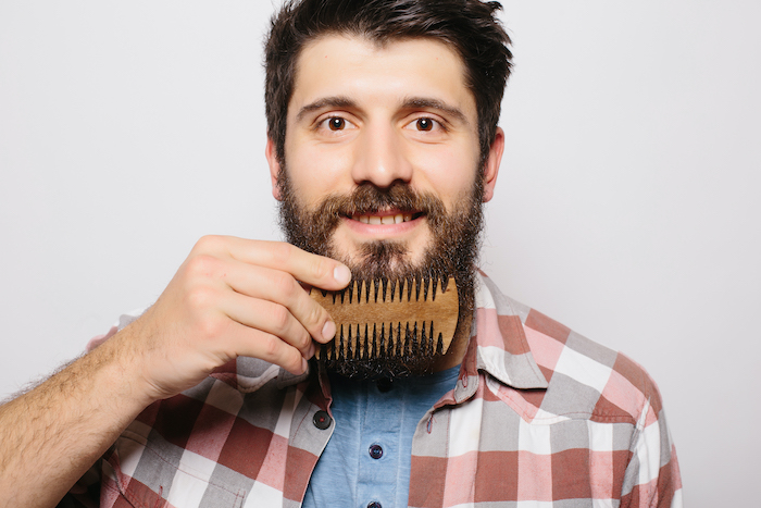 Man combing beard