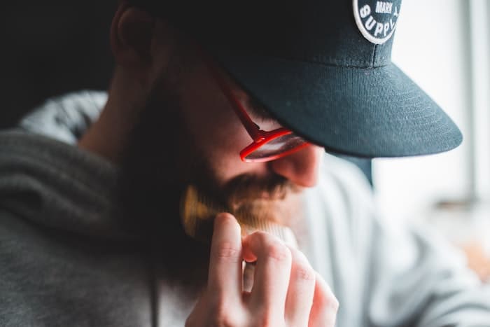 Man combing beard