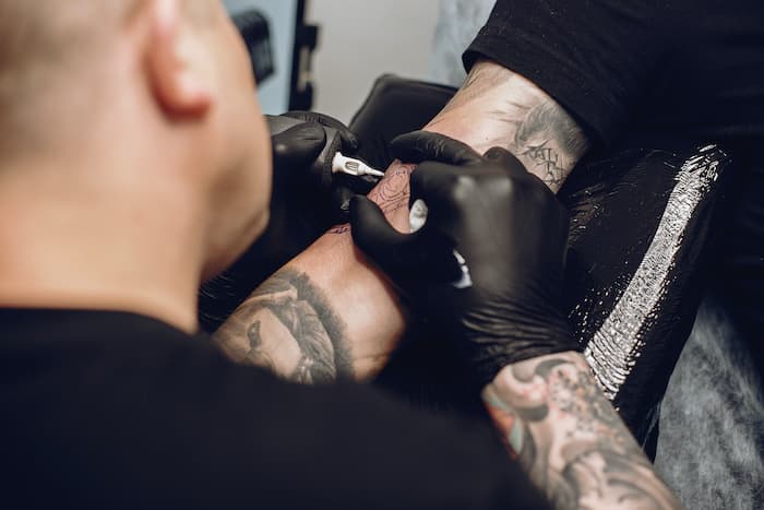 Man doing a tattoo